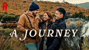 Ảnh chụp màn hình một chương trình du lịch trên Netflix, với những khung cảnh thiên nhiên hùng vĩ và con người thân thiện.