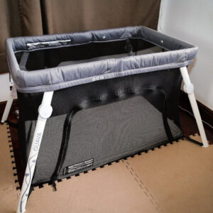 Guava Lotus Travel Crib review set up in room for toddler