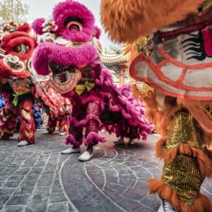 Lion dance at Yaowarat Road during the celebration of the Chinese New Year in Chinatown Bangkok Thailand
