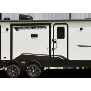Exterior view of the 2024 Heartland NT 24 RV, featuring a sleek design, large windows, and modern graphics.